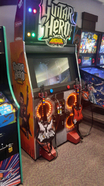 An arcade cabinet of Guitar Hero Arcade.